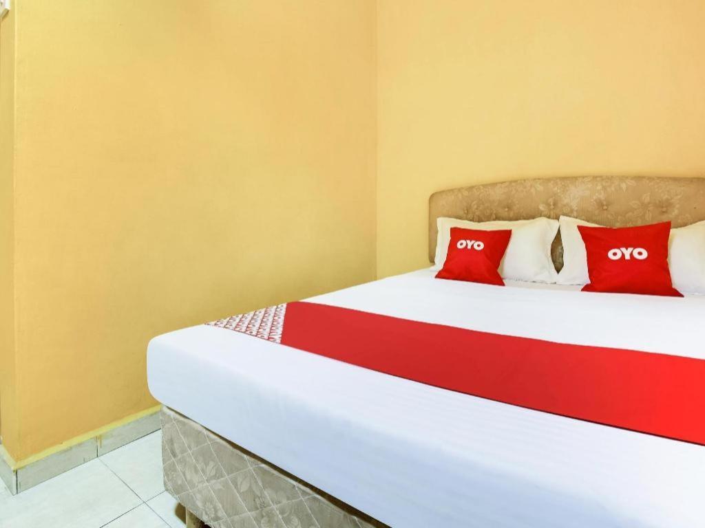 Oyo 89406 Lucky Budget Hotel Nilai Eksteriør bilde
