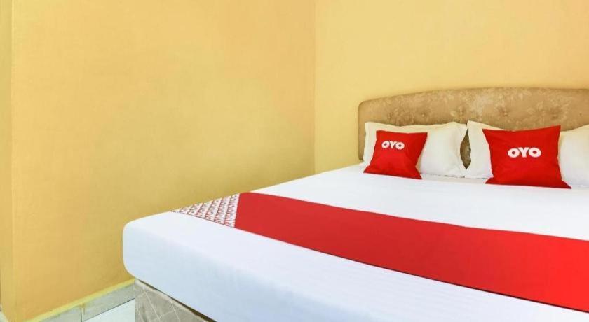 Oyo 89406 Lucky Budget Hotel Nilai Eksteriør bilde